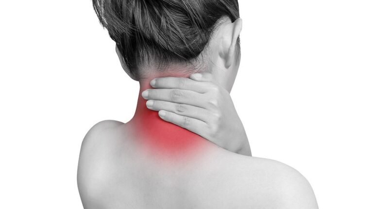 Woman Suffering From Neck Pain Using Hand Massage Painful Neck And Nape | Neck Pain Singapore